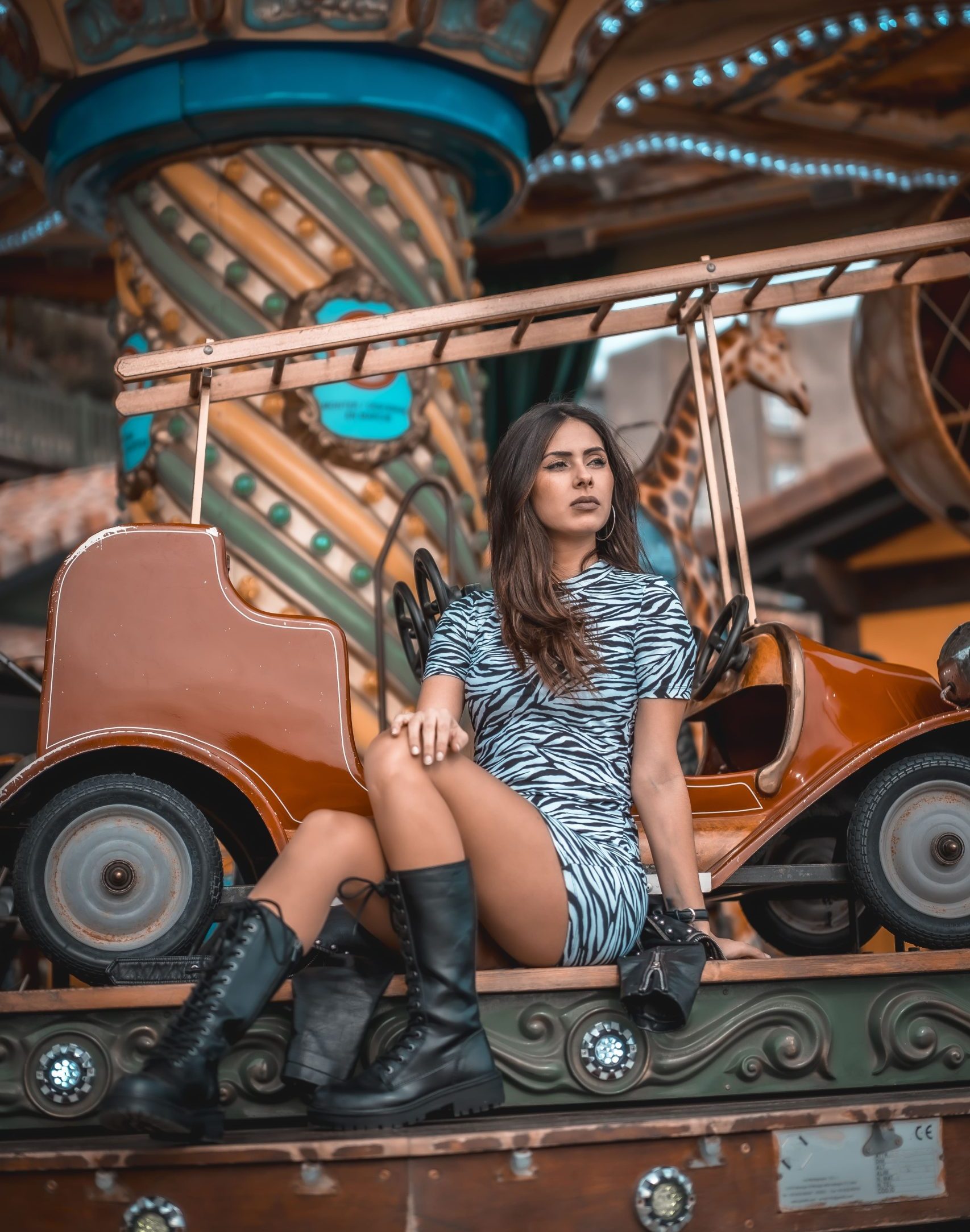 street style sexy caucasian brunette carousel fair with short skirt 1 scaled e1706637099805